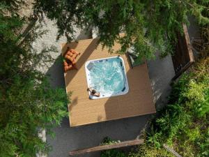 an overhead view of a swimming pool on a wooden deck at Villas Santo António in Baião