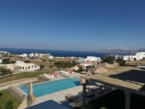 a view of a swimming pool from a resort at Ostria View Resort in Mikonos