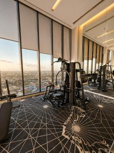 an office with a gym with a view of the city at Infinity Pool at Pattaya Posh in North Pattaya