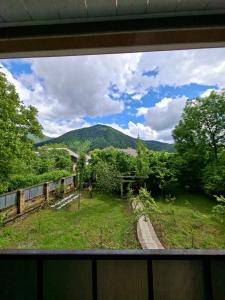 a view of a mountain from a window at Green Paradise in Qax