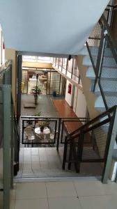 an overhead view of a staircase in a building at Uniflat Hotel Bauru in Bauru