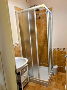 a bathroom with a shower and a sink at Il Vialetto in Cannara +38 photos