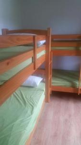 מיטה או מיטות בחדר ב-Albergue Belén