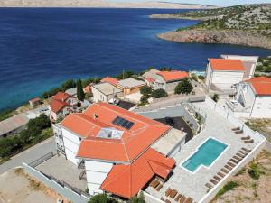 an aerial view of a house with an orange roof at Apartment Delfin-5 by Interhome in Cesarica +31 photos