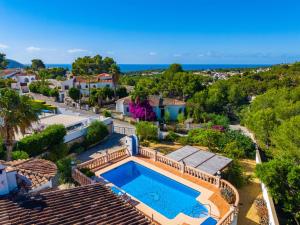 an aerial view of a house with a swimming pool at Holiday Home Mirada al Sol by Interhome in Moraira