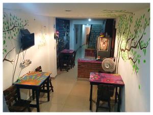 TV a/nebo společenská místnost v ubytování Hostal Santa Maria City