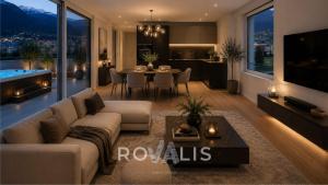 a living room with a couch and a dining room at Private Panorama Spa Brig in Brig