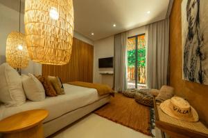 a living room with a couch and a table at Villa Madjha Ecolodge Marrakech in Marrakesh