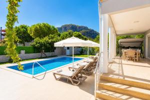 an image of a villa with a swimming pool at Daisy Villa in Dalyan