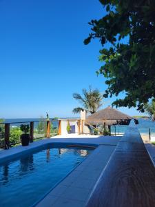 a swimming pool with a view of the ocean at Casa Cancun Hotel Boutique & Eventos in Penha