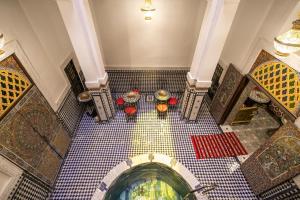 an overhead view of a tile floor in a building at Riad Lile Fes in Fez