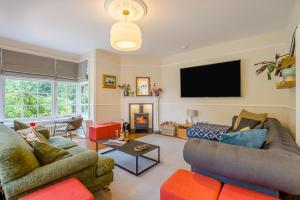 a living room with two couches and a fire place at 5 Bed in Church Stretton oc-t30413 in Church Stretton