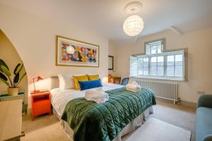 a bedroom with a large bed with towels on it at 5 Bed in Church Stretton oc-t30413 in Church Stretton