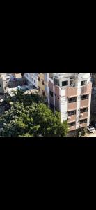 a view of a city with trees and buildings at Karachi Inn in Karachi