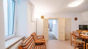 a dining room with a table and chairs and a window at Casa Cenzina by Rentbeat in Locorotondo