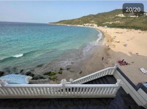 a view of a beach with people on the sand at Appartement à plage Dalia in Dalia