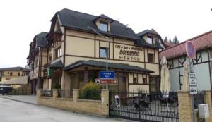 a large building with a sign in front of it at Apartmán KATY in Rajecké Teplice +1 photo