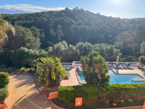 an aerial view of a resort with a swimming pool at EL MIRADOR in Alaior