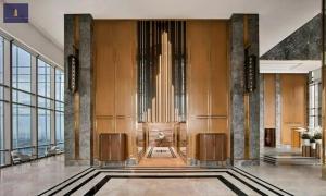 a lobby with a large organ in a building at Landmark 81 Exclusive Panorama Residence in Ho Chi Minh City