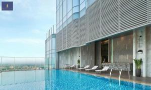 a large building with a swimming pool in front of it at Landmark 81 Exclusive Panorama Residence in Ho Chi Minh City +144 photos