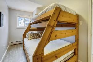 a couple of bunk beds in a room at Tannhauser 313 in Breckenridge