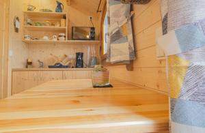 a room with a wooden floor in a house at Le chalet pour la nuit in Pont-Sainte-Marie +7 photos
