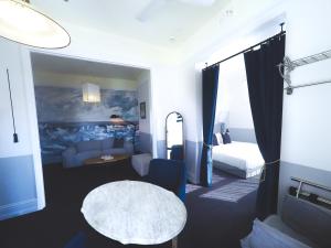 Postel nebo postele na pokoji v ubytování Hotel Palisade