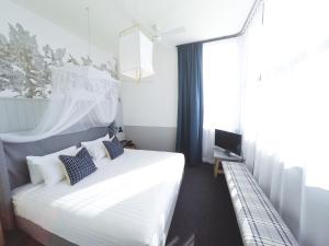 Postel nebo postele na pokoji v ubytování Hotel Palisade