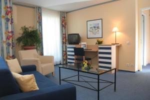 TV a/nebo společenská místnost v ubytování Hotel & Restaurant Seebrücke