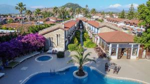 an aerial view of a resort with a swimming pool at Aydos Hotels & Breeze Restaurant in Dalyan