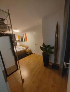 a room with a bed and a mirror in it at Zentrum & Therme in Bad Wörishofen