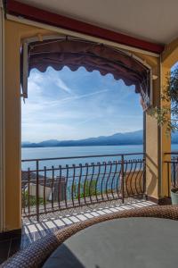 a view of the water from a balcony at Garda Dolce Vita in Torri del Benaco