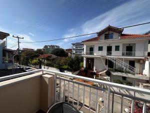 a view from the balcony of a house at Blue Skala - Indigo Apartment I in Skala