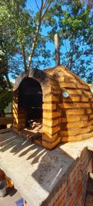 a brick oven sitting on top of a building at Quinta Sinaí in Encarnación
