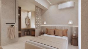 a bedroom with a large bed and a mirror at Pharos by Premium Key in Skiathos +9 photos
