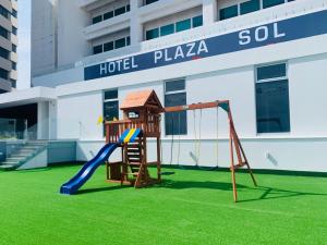 a playground in front of a hotel plaza sol at Hotel Plaza Sol Veracruz in Veracruz