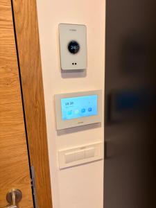 a door with a security camera on a door at Nordic Sun 01 in Kranjska Gora