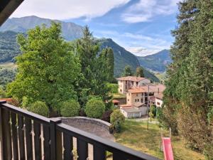 a view from the balcony of a house in the mountains at B&b Villa Giò in Cremeno