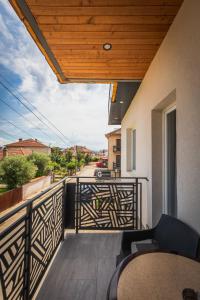 a balcony with a view of a street at G apartments in Gevgelija
