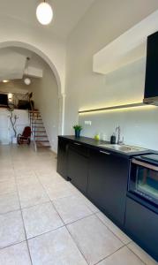 a kitchen with a sink and a counter top at A&D Houses No3 in Patra