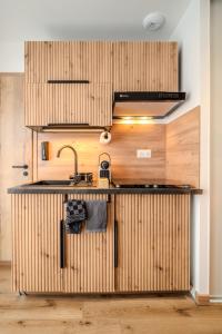 a kitchen with a sink and a counter top at EnergyZen - Spa Alsace - le Refuge des Anges in Bischoffsheim