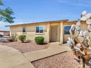 a house with a cactus in front of it at Silk Oak Tempe in Tempe