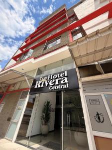 a hotel tyza central sign in front of a building at HOTEL RIVERA CENTRAL in Bucaramanga