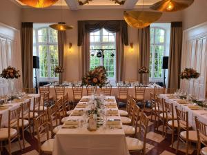 a large banquet room with tables and chairs at Château de Mazan - Handwritten Collection in Mazan +108 photos