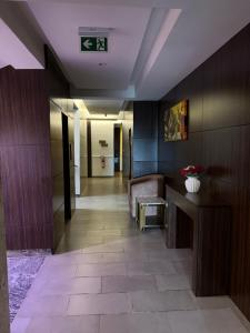 a hallway in a building with a waiting room at Vinpy hotels in Uyo