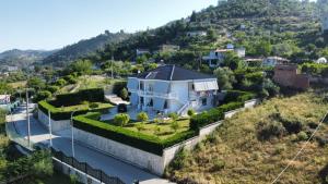 an aerial view of a house on a hill at Villa Manuel in Gramsh