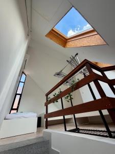 a staircase in a house with a window at Müller's 2 in Siófok