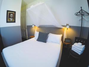 Postel nebo postele na pokoji v ubytování Hotel Palisade