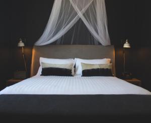 Postel nebo postele na pokoji v ubytování Hotel Palisade