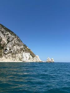 a group of rocks in the middle of the ocean at Da Elio in Montacuto